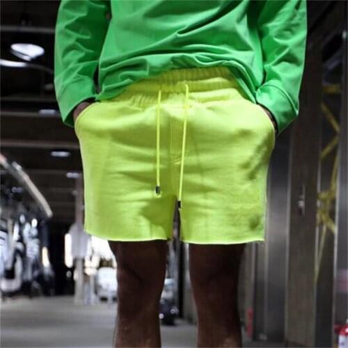 2021 Korean mens new summer fluorescent ribbon flash fashion shorts straight sports beach pants large