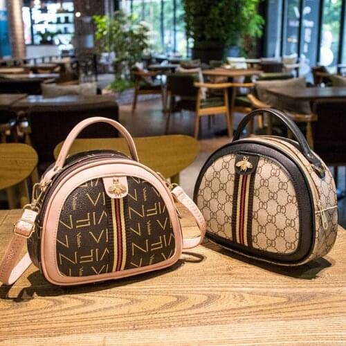 Net celebrity high quality new fashion pu female bag printing portable shoulder bag messenger small round bag