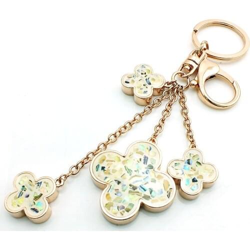 JINGLANG Brand New Fashion Gold Color Lobster Clasp Key Rings Dangle Clover Charms Women keychain Handbag Luxury Jewelry