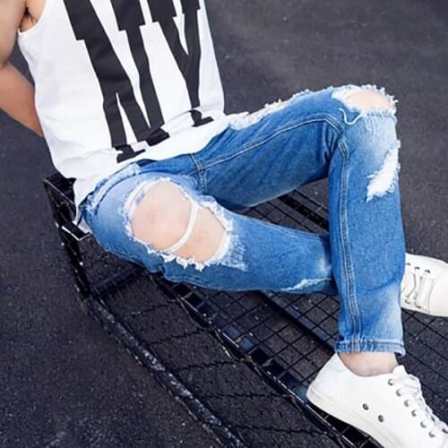 Summer big hole scraping Slim nine points mens jeans trousers feet pants Korean version of the trend large size 9 pants