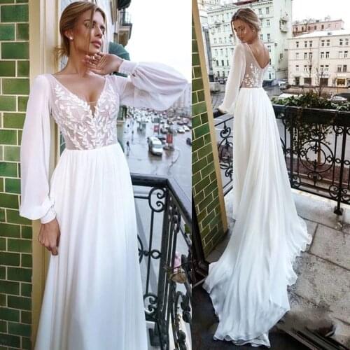 Charming Sweep Train Long Sleeve Wedding Dresses 2021 A-Line Sexy V-Neck Appliques Elegant Chiffon Bridal Gown Backless