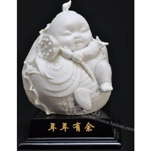 Cute boy mascot mid fish ornaments crafts with ceramic decoration Feng Shui years years