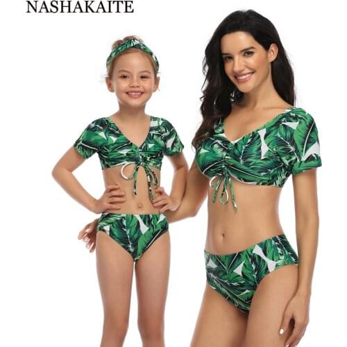 NASHAKAITE Mommy and me swimsuit Short Sleeve V-neck Lace Up Identical Swimsuit Green Tropical Leaves Printed Family swimwear