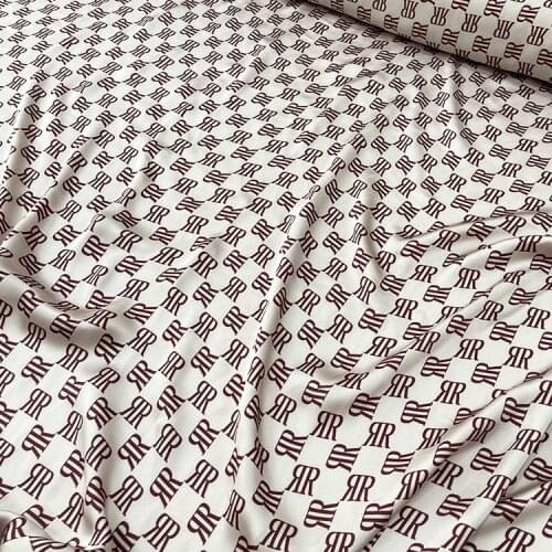 Brand imitation silk stretch satin high-end fashion DIY letter printing fabric 100% polyester dresses summer thin needlework