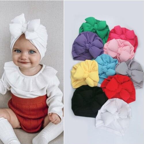 18 Pcs/Lot Solid 2020 New Baby Pullover Hat 0-18M Cotton Topknot Designed Sponge Bow Newborn Children Beanies Caps