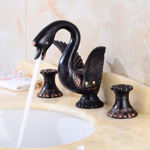 Widespread Basin Faucets Brass luxury Golden/Black Bronze Swan Deck Mounted Bathroom Sink Faucets 3 Hole Hot And Cold Water Taps