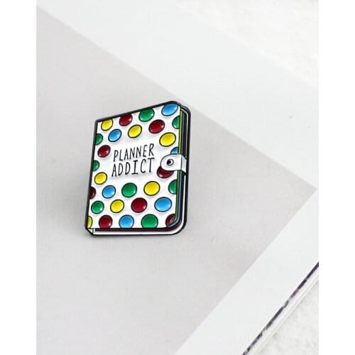 Colored small circle decorated with letters in the middle of the book brooch to students accessories related to literature