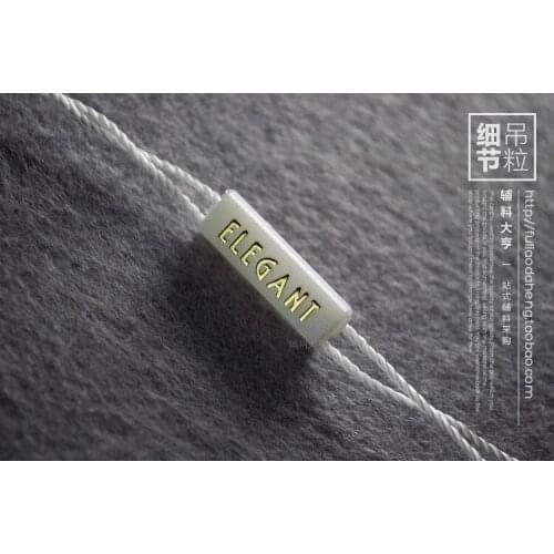 500PCS "ELEGANT" clothes seal/ plastic seal tag/string lock /string buckle/string hang tag/STRING SEAL