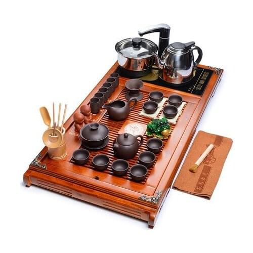 Tea sets special price Zisha Chinese Kung Fu tea set household Induction Cooker solid wood tea tray porcelain tea set