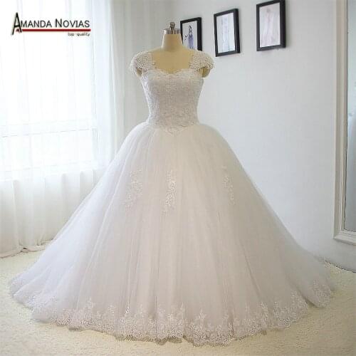 Shining beading wedding dress white puffy cap sleeve ball gown