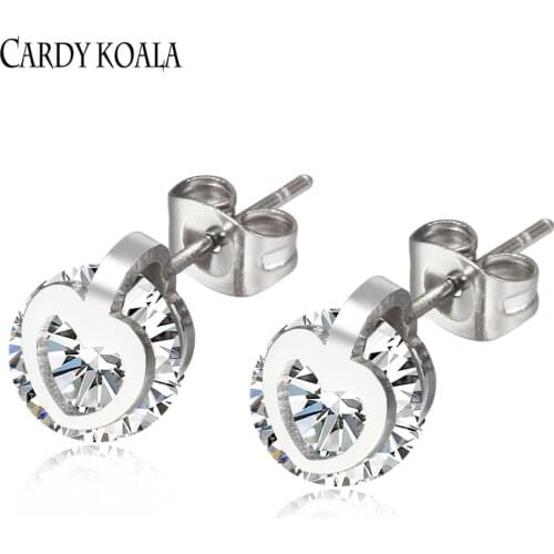 Personality creative hollow heart diamond-studded stainless steel titanium steel temperament female earrings ear jewelry