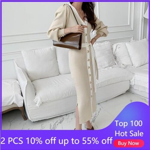 Autumn/winter v-neck women long dress elegant belt single-breasted hubble-bubble sleeve knit dress 3515