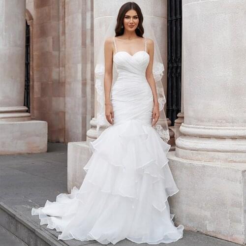 Elegant Organza Spaghetti Straps Sweetheart Mermaid Wedding Gowns 2021 Sweep Train Ruffles Backless Bridal Dresses
