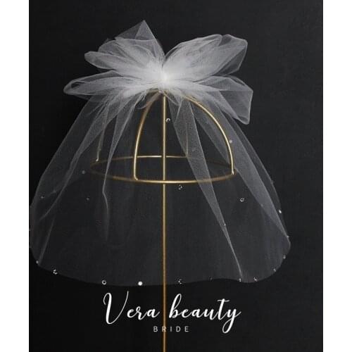 French white bow veil bride styling tiara headdress banquet photography and makeup jewelry