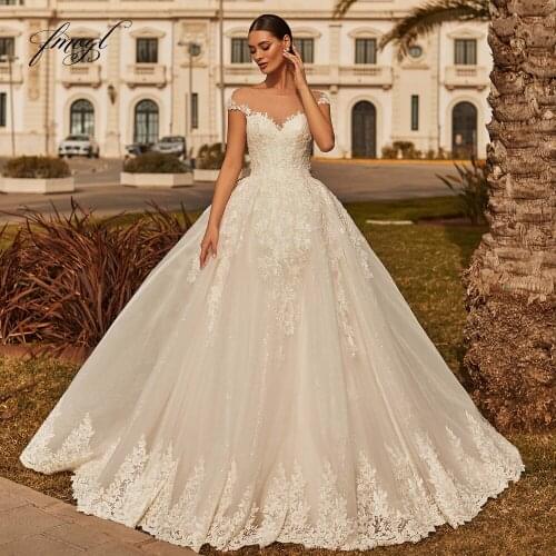 Fmogl Sexy Backless Appliques Lace Vintage Wedding Dresses 2021 Luxury Cap Sleeve Beaded Court Train A Line Bridal Gowns