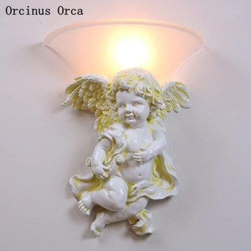 European retro Angel wall lamp living room corridor bedroom bedside lamp modern creative Cupid resin wall lamp