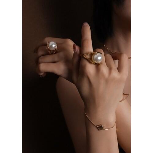 Y-shaped imitation pearl Italian designer unique style ring female exaggerated personality titanium steel 18k gold never fade
