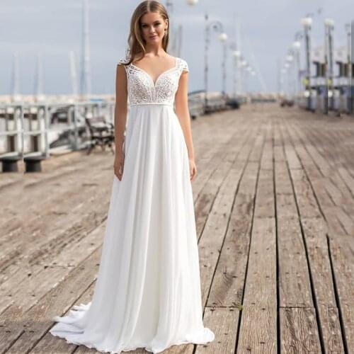 2021 On Sale Charming Lace Cap Sleeves Bridal Wedding Dresses Illusion Neckline Sheer Back Beach Wedding Gowns for Bride Cheap