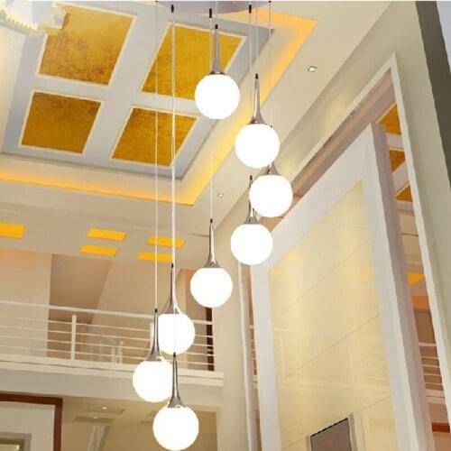 Modern minimalist stair chandelier rotating long chandelier Villa double creative glass ball personality restaurant LED lights