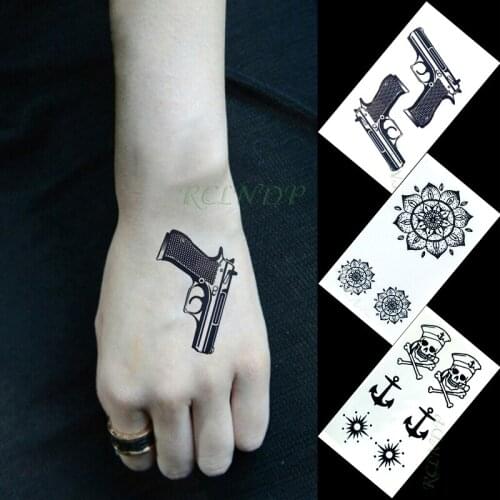 Waterproof Temporary Tattoo Sticker gun sun flower pirate symbol small tatto flash tatoo fake tattoos for girl women men kid