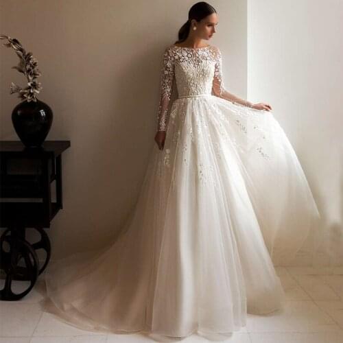 Deep V-neck Spaghetti Straps Snow Tulle Champagne Wedding Dress Lace Backless Bridal Dress vestido de noiva renda