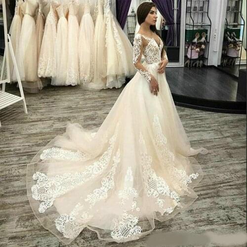 2020 Elegant V Neck See Through Champagne Tulle A Line Wedding Dress Appliques Lace Long Sleeves Bridal Dresses Buttons Back Wed