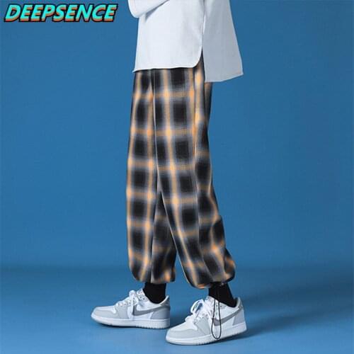 2021 New Polyester Loose Harajuku style Grid Wide Leg Pants Men Casual Drawstring Elastic Leg opening Ankle Length Pants Men