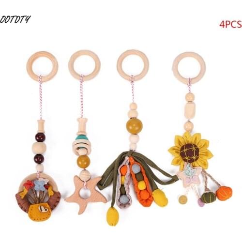 4 Pcs/Set Baby Play Gym Frame Stroller Hanging Pendants Wooden Ring Teether Molar Teething Nursing Rattle Toys Infant Room Decor