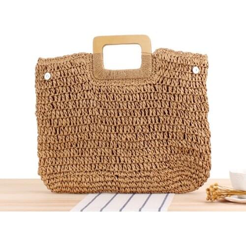 Retro Hand Woven Large Capacity Portable Hollow Straw Bag Seaside Vacation Beach Handbags for Women 2021
