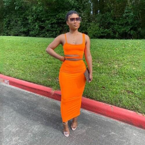 European and American summer new casual womens wear orange green black hollowed-out knitted vest skirt two-piece suit