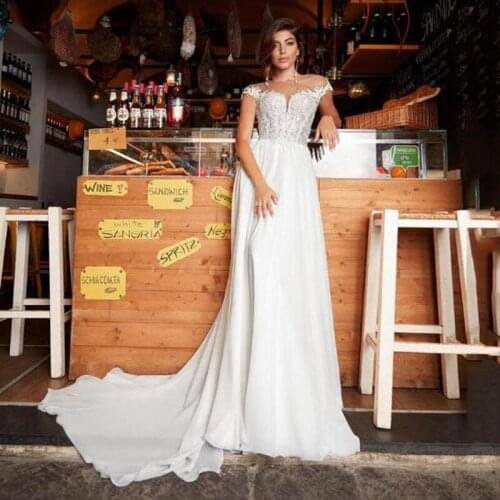 Elegant Wedding Dresses Off The Shoulder Lace Appliques Lace Appliques Illusion Beach Bridal Gowns Court Train Vestidos De Novia