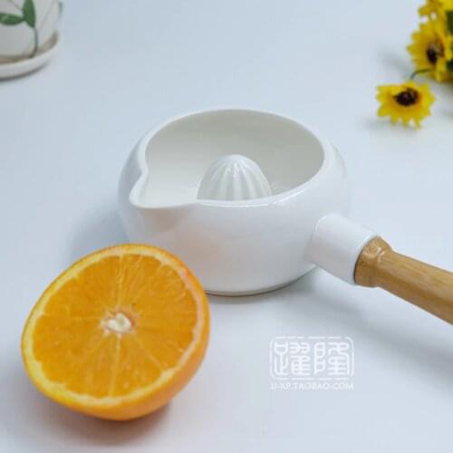 Wooden handle Ceramic juicing bowl Orange lemon juices Ceramic juicer manual Rolling filter juice Grinding bowl