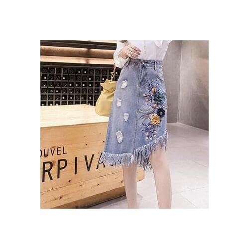2021 spring and autumn new fashion denim skirt female mid-skirt high waist A-line embroidery tassels asymmetrical hole tide