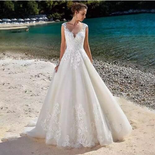Wedding Dress A-Line Sheer Neck Cap Sleeve Button Lace Appliques Sequined Tulle Floor Length Sweep Train Bride Gown 2021