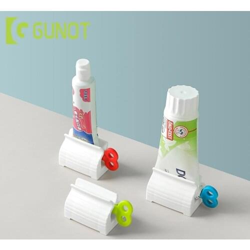 GUNOT Toothpaste Squeezer Toothpaste Dispenser Plastic Cream Tube Squeezing Dispenser Rolling Tube Squeezer Bathroom Accessories