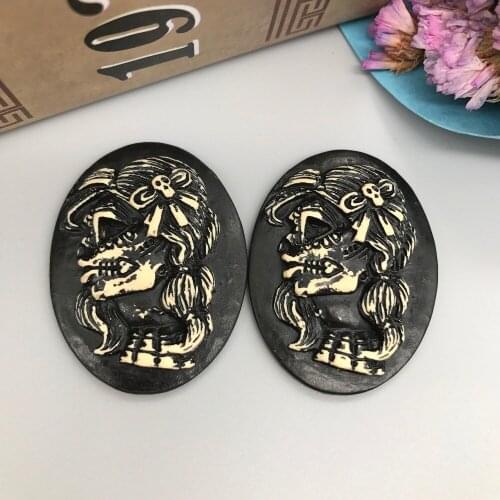 Free shipping!resin selling skull Cameo.Resin cameo black background Flatback Cabochon for Necklace Pendant .Jewelry.DIY30*40mm