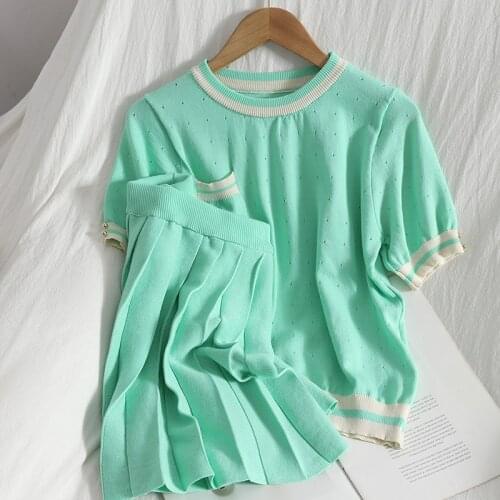 Summer contrast color o-neck pullover pocket hollow top + solid color thin pleated skirt knitted two-piece women