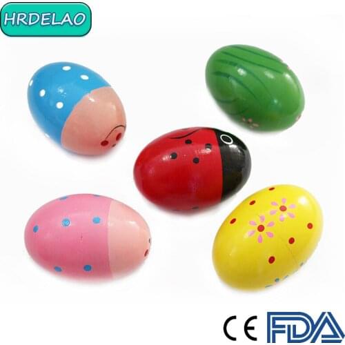 About 5*7Cm 1Pcs Montessori Color Educational toys Wooden 3D Sand egg Musical instrumentchildEarly Education Sand ball Grip Toy