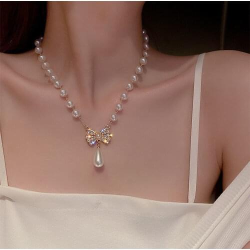 Bowknot Pendant Pearl Necklace Wild Earrings Light Luxury Niche Design Clavicle Chain Advanced Necklace