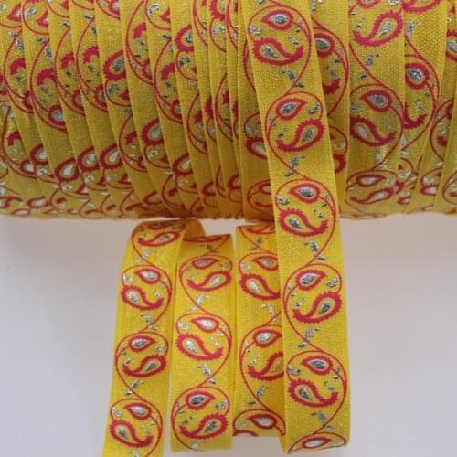 5/8 Paisley silver foil fold over elastic FOE ribbon 50yards #645 yellow