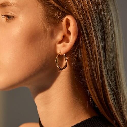 European and American new personality twist earrings women cold wind simple retro design twist earring ear buckle hoop earrings