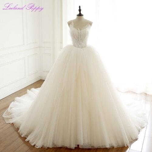 Elegant A-line V-neck Tulle Wedding Dresses Crystal Beaded Sleeveless Corset Back Ruched Bridal Gowns Chapel Train Empire Waist