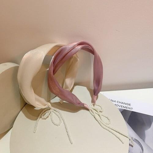 South Koreas new tassel headband temperament fairy style clear mercerized fabric pearl rear hanging false earrings headband