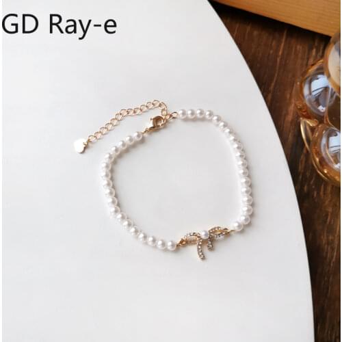 Korean Jewelry Womens Bowknot Acrylic Pearl Adjustable Crystal Bracelet 358