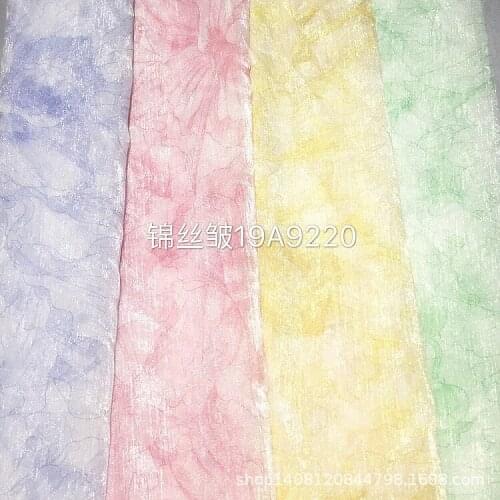 New factory direct sale spot high-grade beach dress skirt semi-permeable kam silk knit fabric printed chiffon fabric