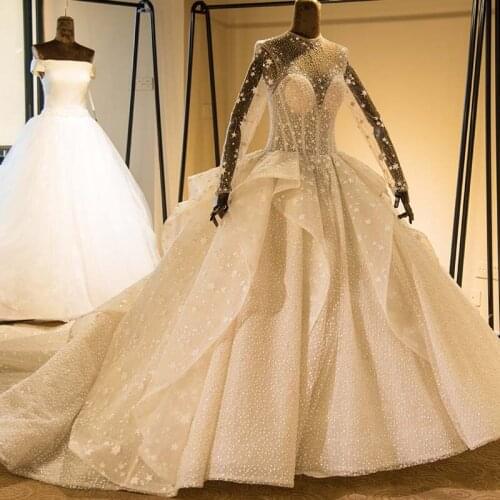 Hot 2021 New Arrivals Luxury Beaded Lace Gown Wedding Dresses Beading Bridal Gown Vestidos De Noiva Long Sleeves