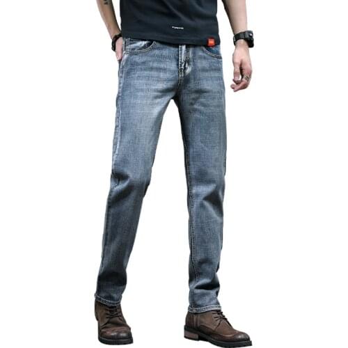 Mens solid color jeans Japanese and Korean pants business casual slim fit plus size