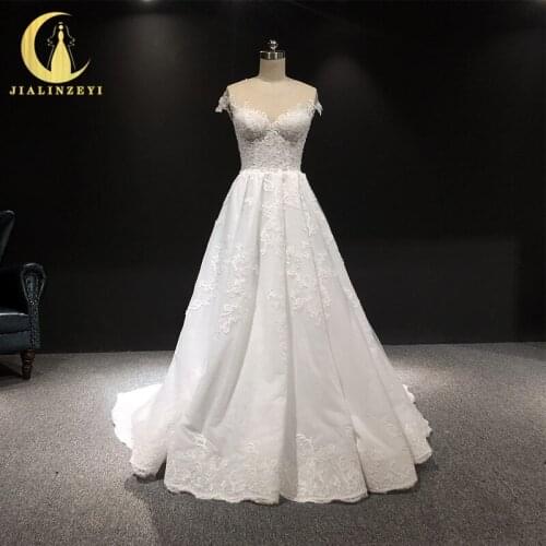 JIALINZEYI Real Picture Crew Neck Cap Sleeves Lace A-line Fashion New Bridal Wedding Dresses 2021