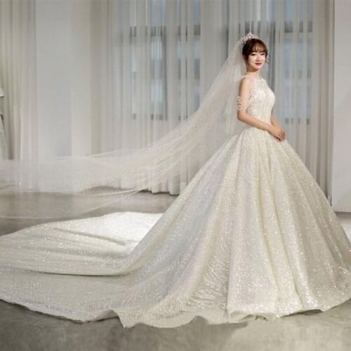 Luxury Sweep Train Ball Gown Wedding Dress 2021 Bridal Gown Halter Beading Tassel Sparking Dubai Bride Dress Custom Made Sizes