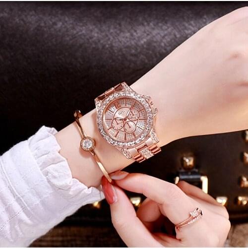 DZG new gold three - color quartz watch fashion leisure false three - eye six - needle hydrodrill alloy watch ladies watch